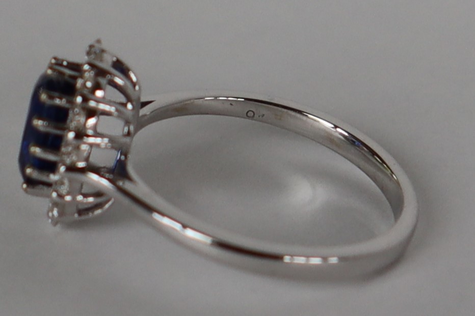 An 18ct white gold kyanite and diamond cluster ring set with an oval faceted Kyanite approximately - Image 6 of 9