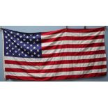 An American Flag, signed by Samuel L. Jackson and Colin Firth.