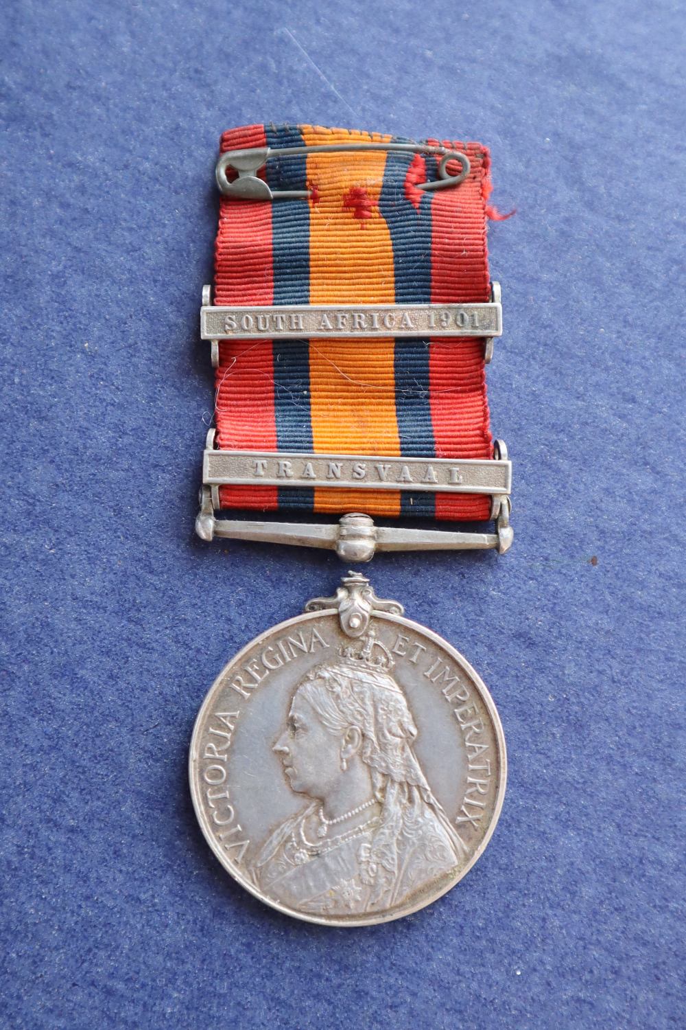 A Victorian South African medal with South Africa 1901 and Transvaal bars issued to "1163 Pte G J
