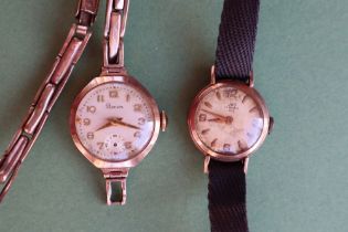 A lady's 9ct yellow gold Pioneer wristwatch with a silvered dial,
