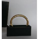 An 18ct yellow gold hinged bangle, of rope twist form,