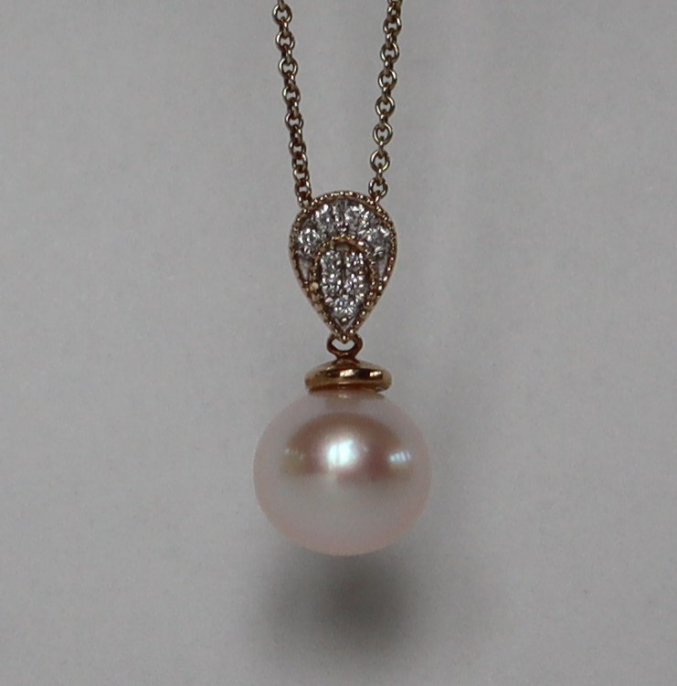 A 9ct yellow gold cultured pearl and diamond inverted pear-shape pendant and chain, - Image 4 of 6