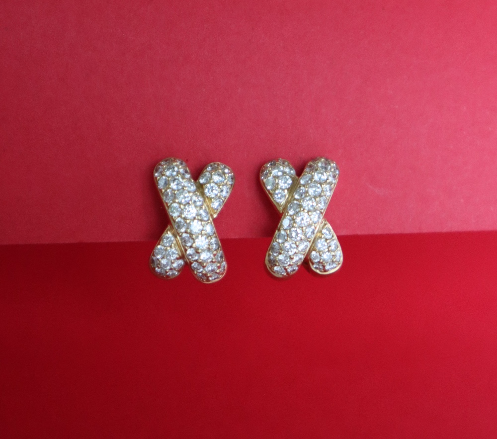 A pair of 18ct yellow gold diamond set cross earrings,