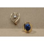 A 9ct gold ring set with a lapis lazuli panel, size K, together with a 9ct gold opal set brooch,