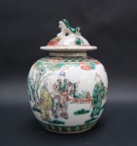 A Chinese Famille Verte porcelain vase and cover, the domed cover with a dog of foo finial,