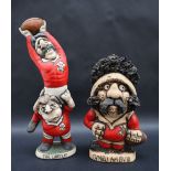 A John Hughes pottery Grogg depicting two Welsh Rugby players,