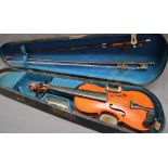 A child's violin, with a two piece back and ebony stringing,