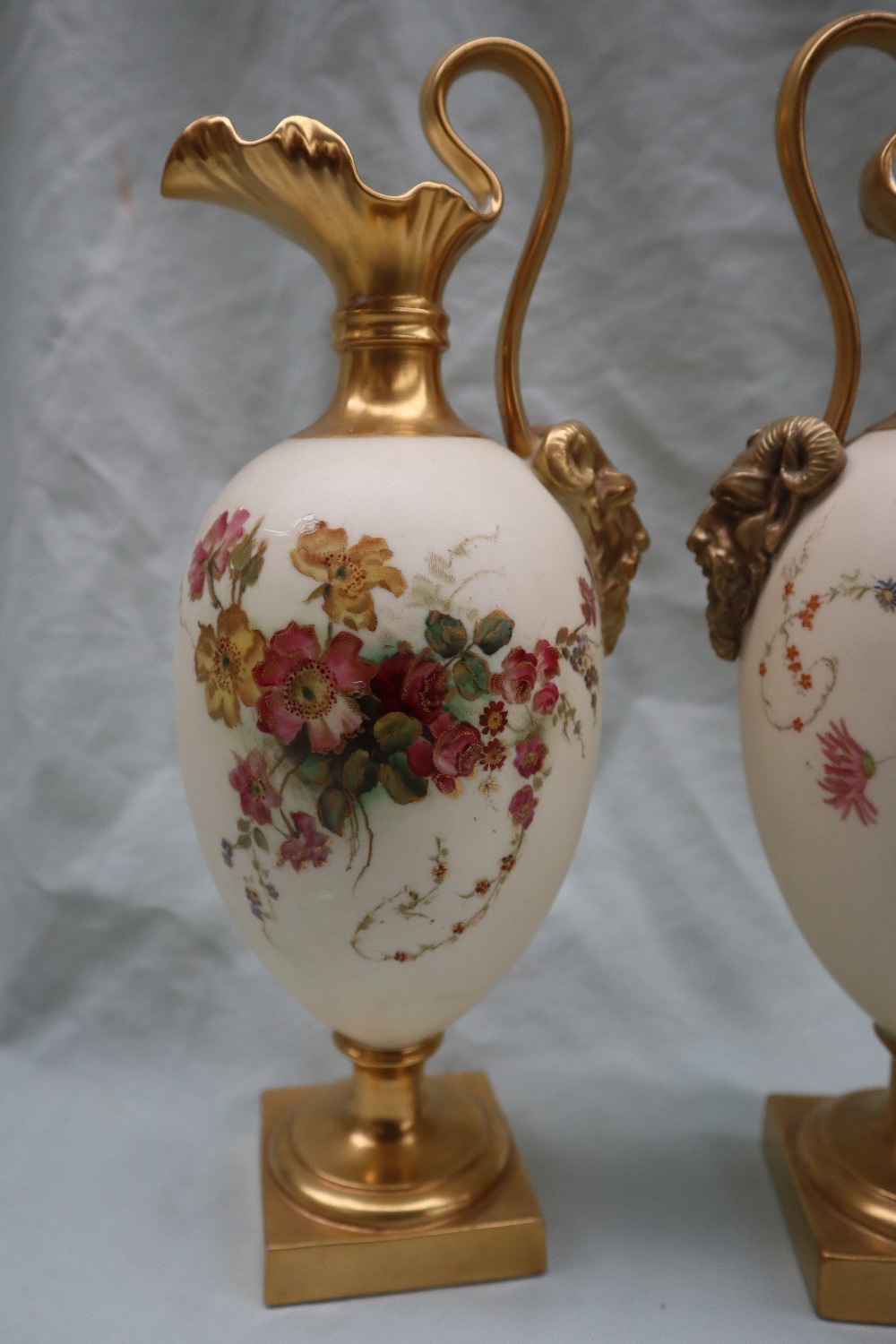 A pair of Royal Worcester porcelain ewers with wavy spout, mask terminal handles, - Image 2 of 10