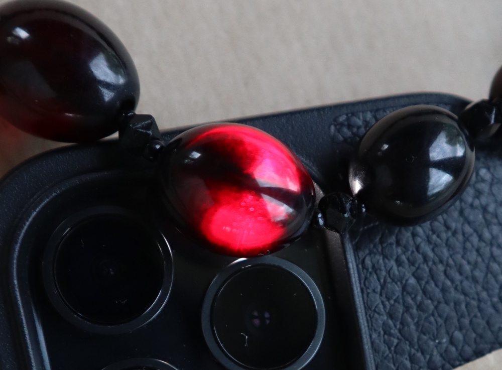 A Cherry amber / bakelite bead necklaces, with oval beads ranging in size from, 23mm to 8mm, - Image 11 of 14