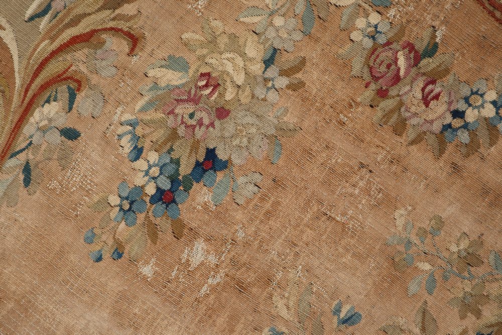 An 18th century French Aubusson medallion pastoral tapestry with a floral swag border, - Image 4 of 8