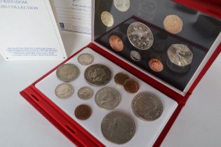 A 1993 United Kingdom proof coin collection together with a George V 1935 Crowns,