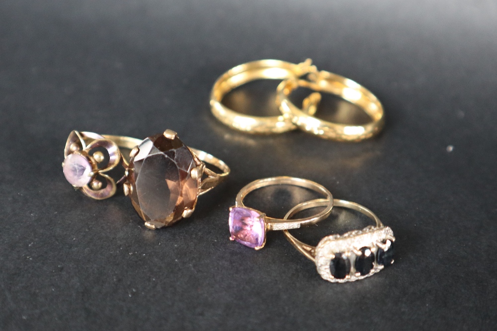 A 9ct yellow gold amethyst set dress ring together with two other 9ct gold rings another ring and - Image 2 of 8