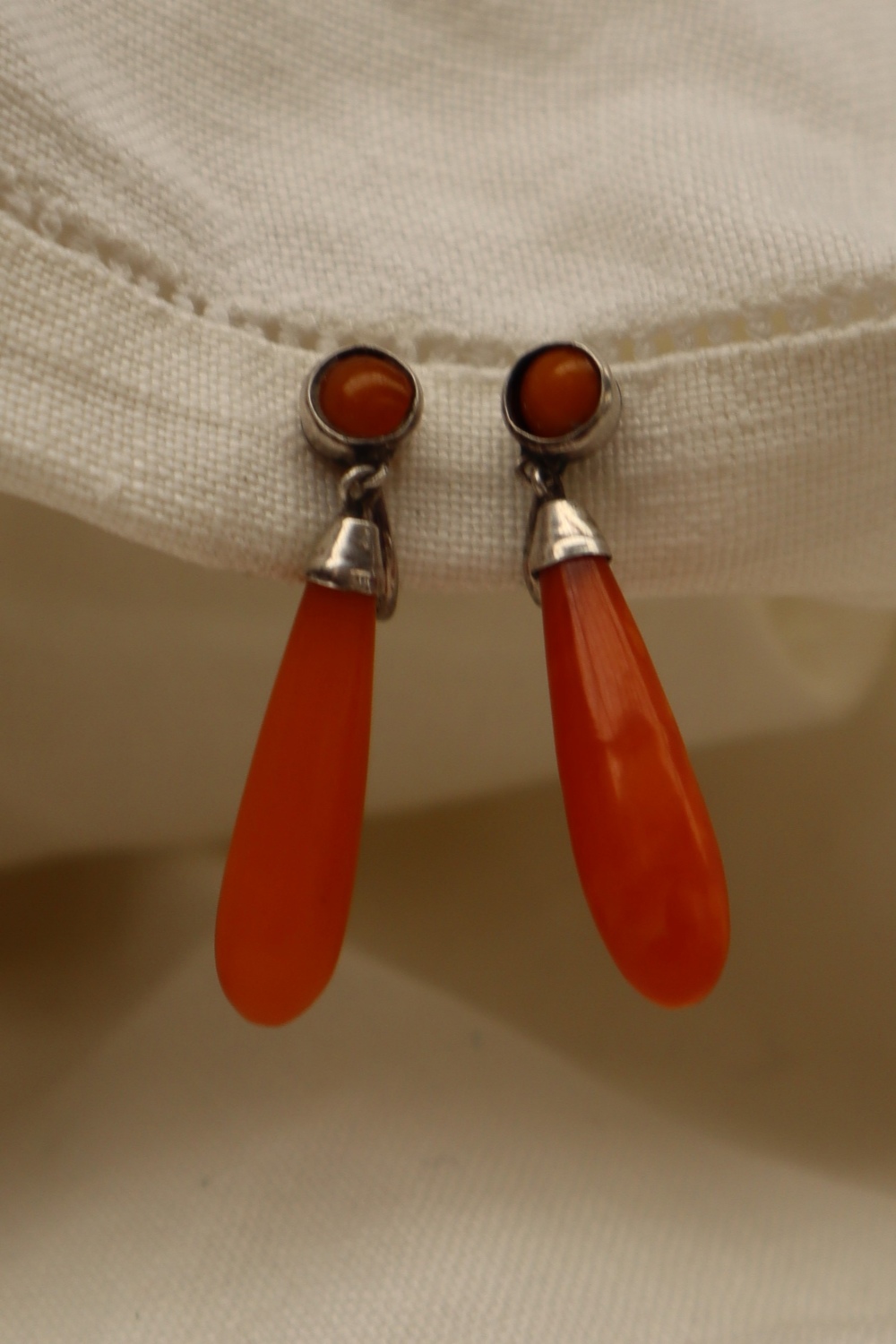 A pair of amber drop earrings, mounted in white metal, - Image 2 of 3