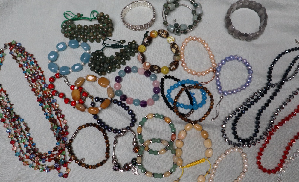 A collection of hardstone beaded bracelets