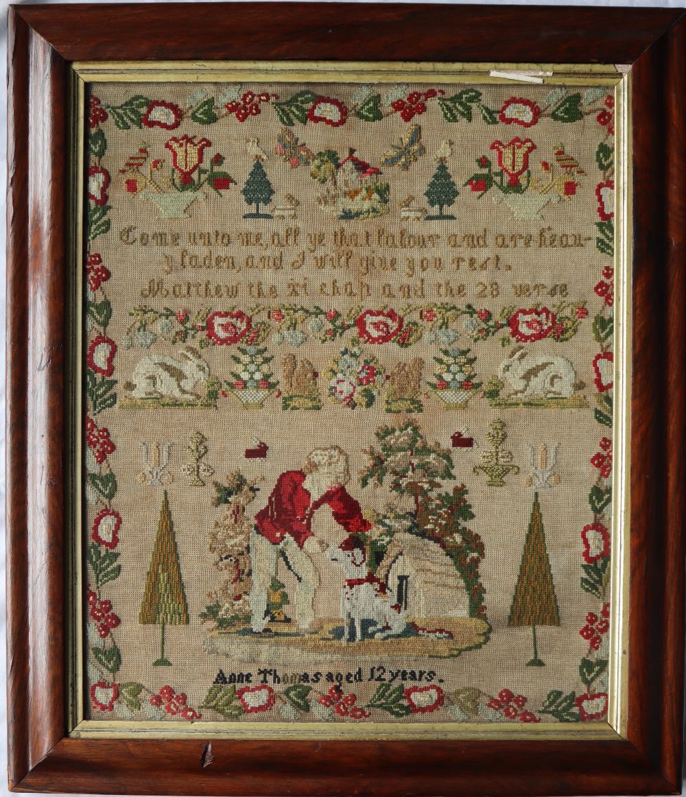 A 19th century woolwork sampler with a flower and leaf border with overall decoration of a cottage, - Image 2 of 4