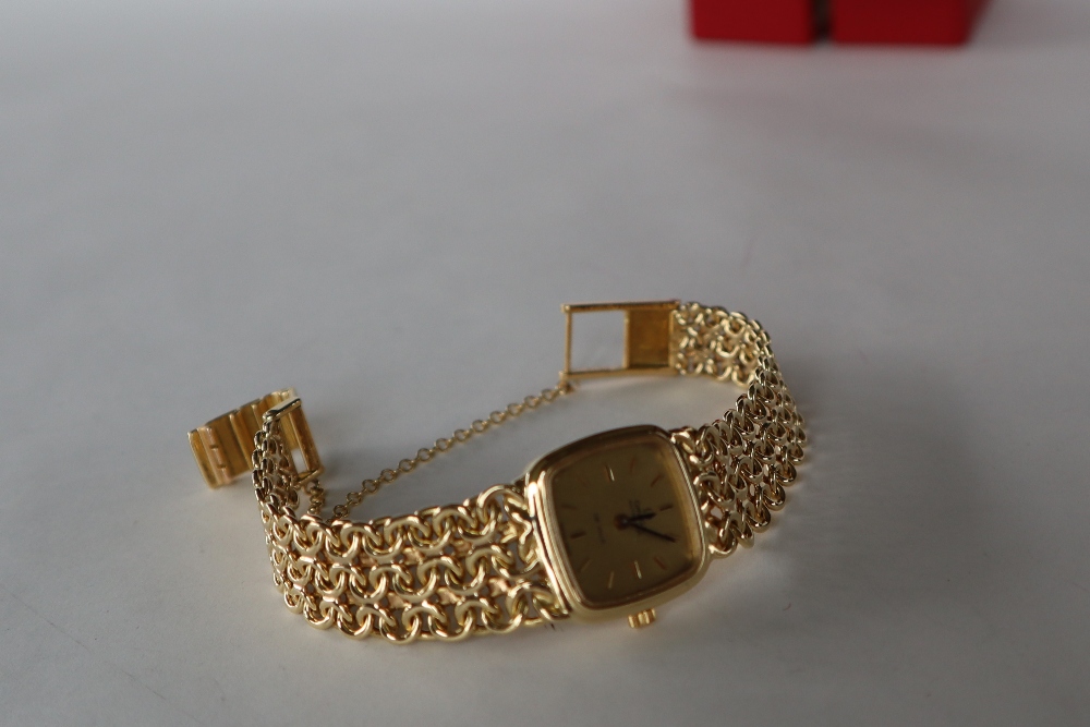 A lady's 18ct gold Omega Automatic De Ville wristwatch with a square dial and batons on an 18ct - Image 3 of 9