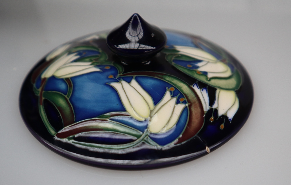 A Moorcroft pottery vase decorated with birds and fruit to a royal blue ground, - Image 6 of 9