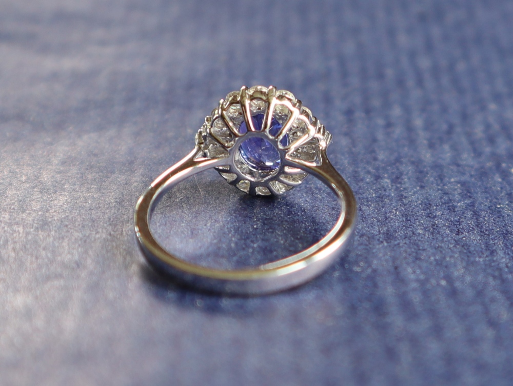 A tanzanite and diamond cluster ring, the central oval faceted tanzanite approximately 1.54ct. - Image 2 of 5