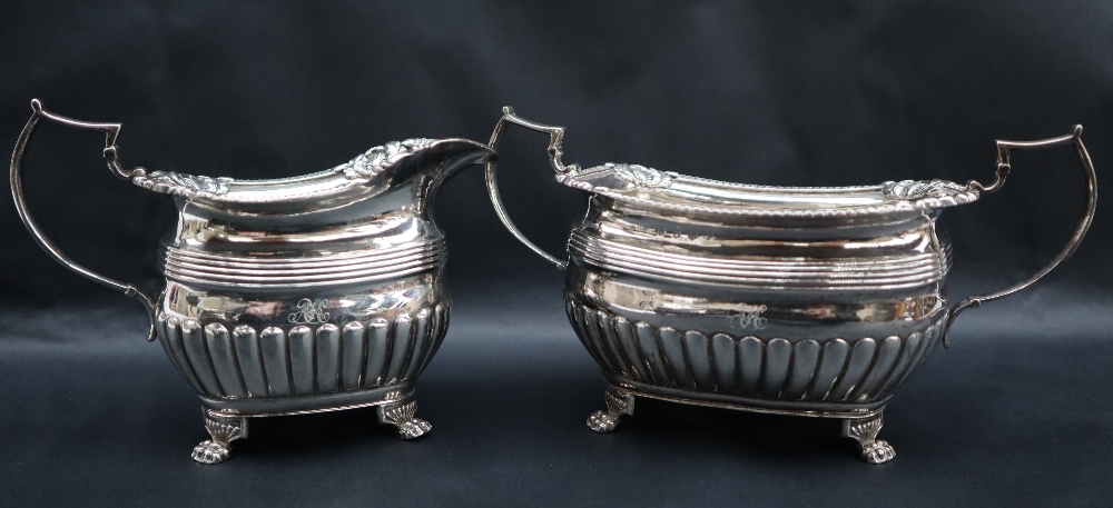 A George III Irish silver three piece tea set, - Image 5 of 9