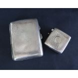 A George V silver cigarette case of rectangular form with a chequer board pattern and initials,