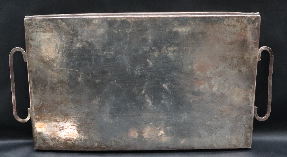 A white metal twin handled tray of rectangular form decorated with scrolls and leaves, overall 42. - Image 2 of 2