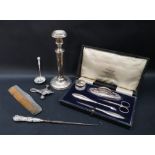 A George V silver manicure set, including a nail buffer, scissors, nail file etc,