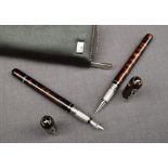 A pair of Dunhill sidecars pens,