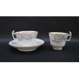 A Swansea porcelain Forget Me Not pattern trio, including a tea cup,