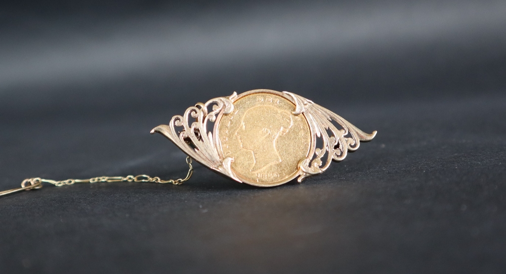 A Victorian gold half sovereign dated 1850, mounted in a 9ct yellow gold brooch setting,