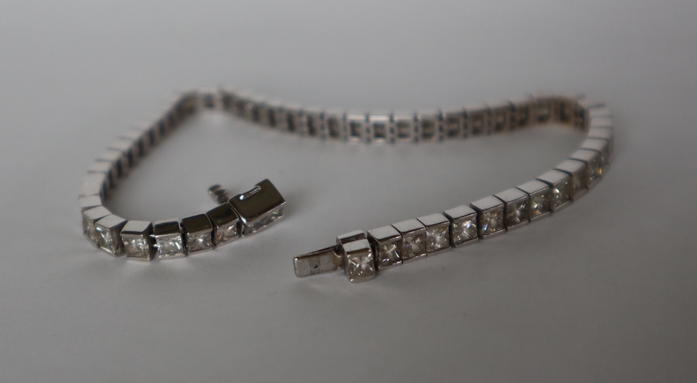 An 18ct white gold diamond set tennis bracelet, - Image 7 of 10