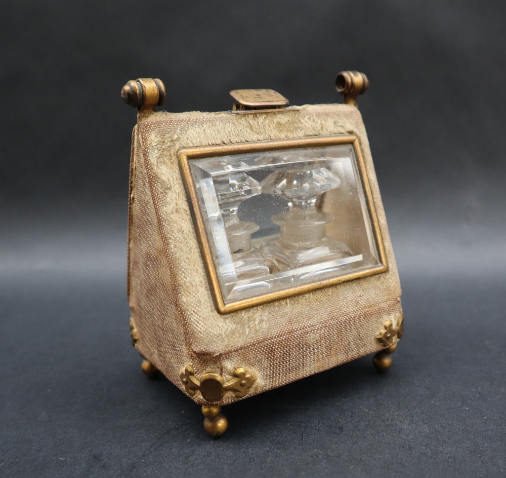 A scent bottle casket of triangular shape with glazed panels with gilt metal mounts and similar