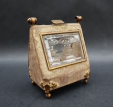 A scent bottle casket of triangular shape with glazed panels with gilt metal mounts and similar