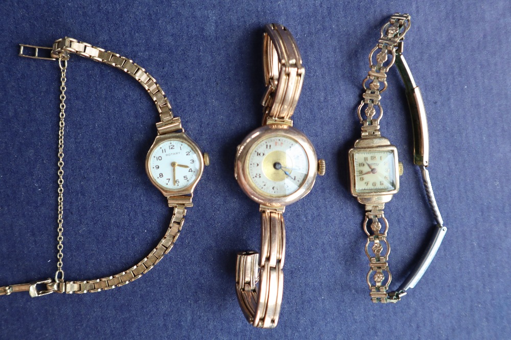 A lady's 9ct yellow gold Rotary wristwatch on a 9ct gold strap together with another lady's 9ct