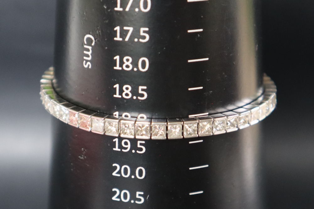 An 18ct white gold diamond set tennis bracelet, - Image 10 of 10
