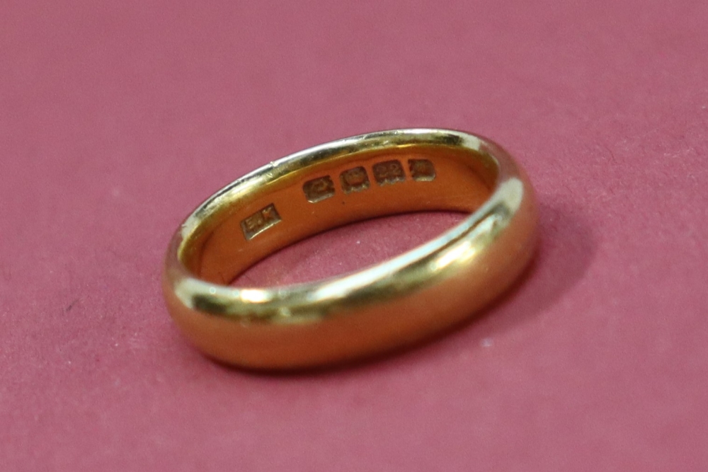 A 22ct yellow gold wedding band, size L, approximately 6.