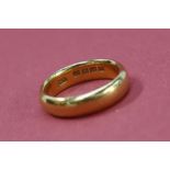 A 22ct yellow gold wedding band, size L, approximately 6.