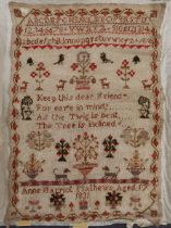 A William IV needlework sampler with the alphabet to the top, trees, dogs and other animals,