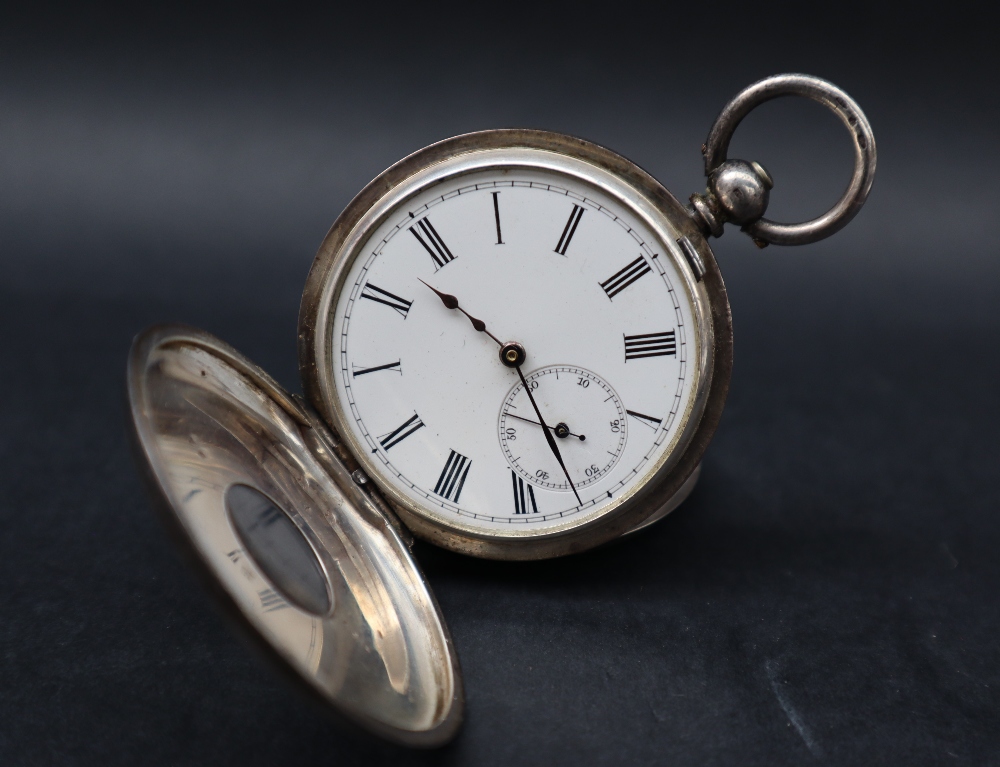 A silver open faced pocket watch, with an enamel dial and Roman numeral, - Bild 2 aus 7