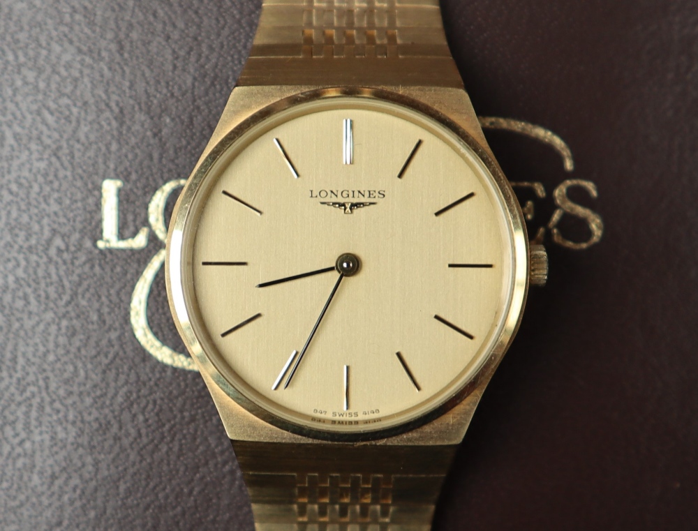 A gentleman's Longines wristwatch, in gilt metal on a gilt metal strap, - Image 5 of 10