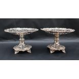 A pair of George V silver comports with a pierced top and grapes and leaves decoration, Sheffield,