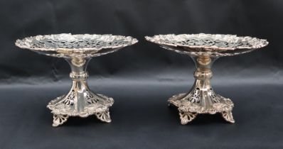 A pair of George V silver comports with a pierced top and grapes and leaves decoration, Sheffield,