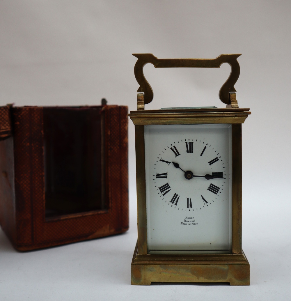 A brass cased carriage timepiece,