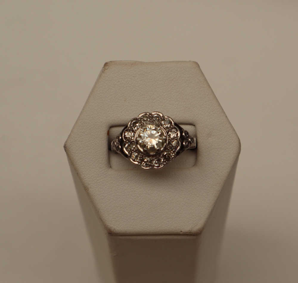 A diamond cluster ring, the central round old cut diamond, approximately 0. - Image 2 of 7