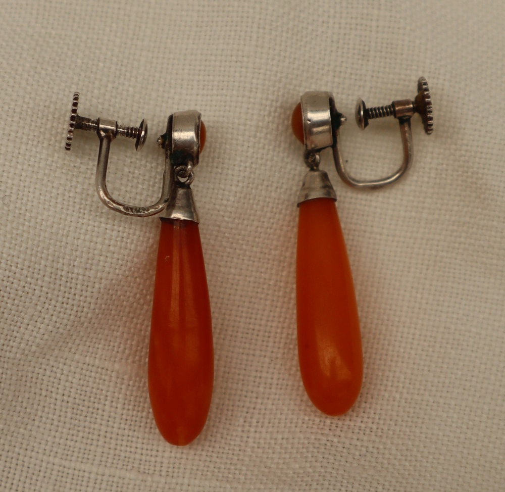 A pair of amber drop earrings, mounted in white metal, - Image 3 of 3