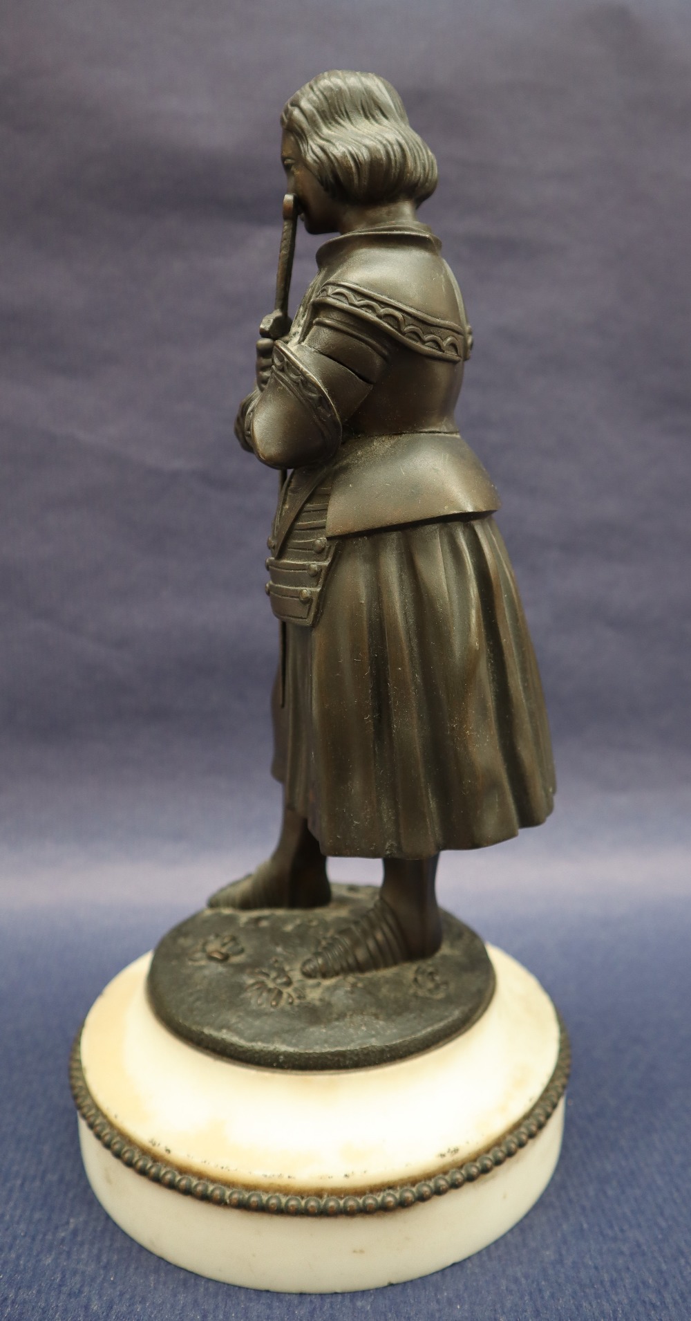 A bronze figure of Joan of Arc, with head bowed clutching a sword, on a circular marble base, 27. - Image 3 of 8