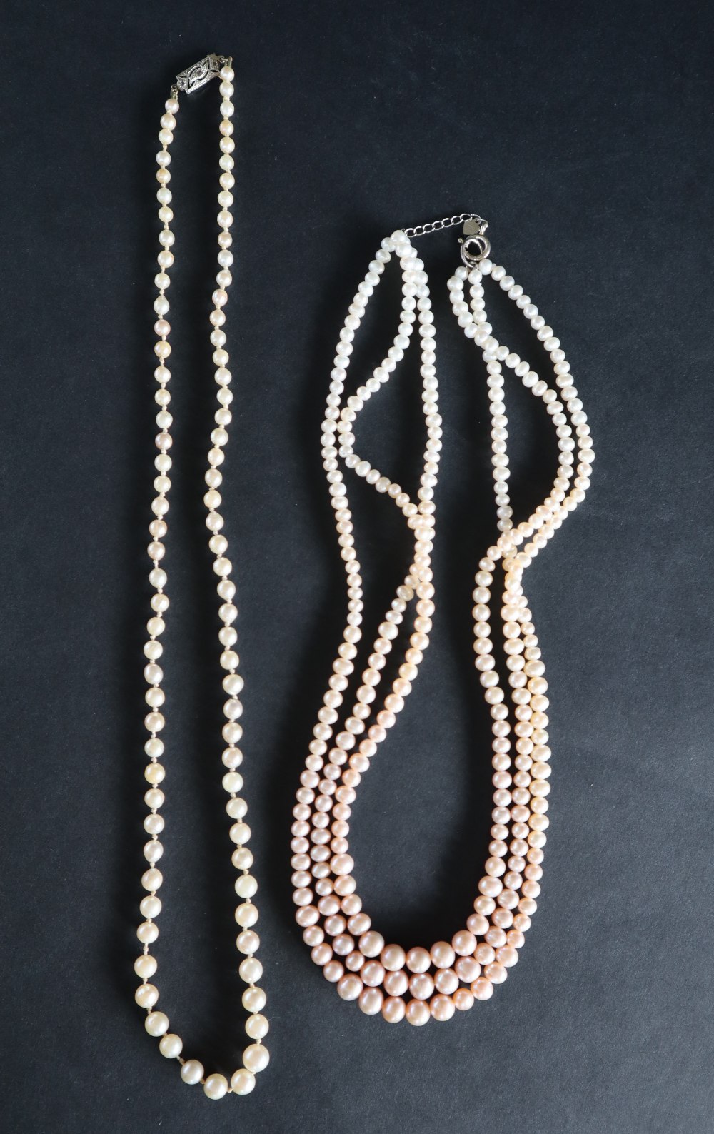 A pearl necklace with graduated pearls, ranging from 6mm to 3mm diameter, to a 9ct white gold clasp, - Image 2 of 5
