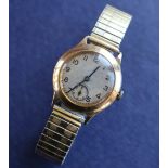 An Hefik Watch Co 9ct gold wristwatch with a gilt dial,