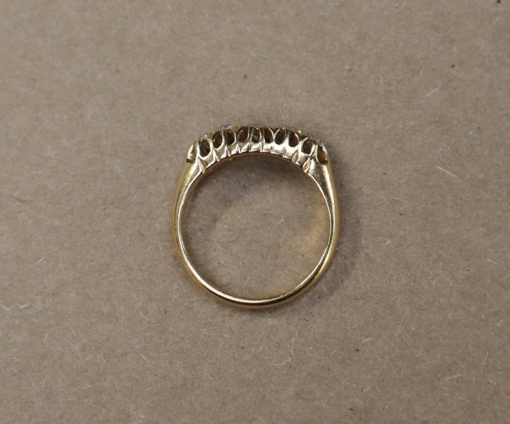An 18ct yellow gold ring set with five graduated old cut diamonds, size K, approximately 3. - Image 3 of 4