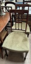 A pair of Edwardian inlaid bedroom chairs