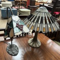 A Tiffany style table lamp together with another Tiffany style table lamp
